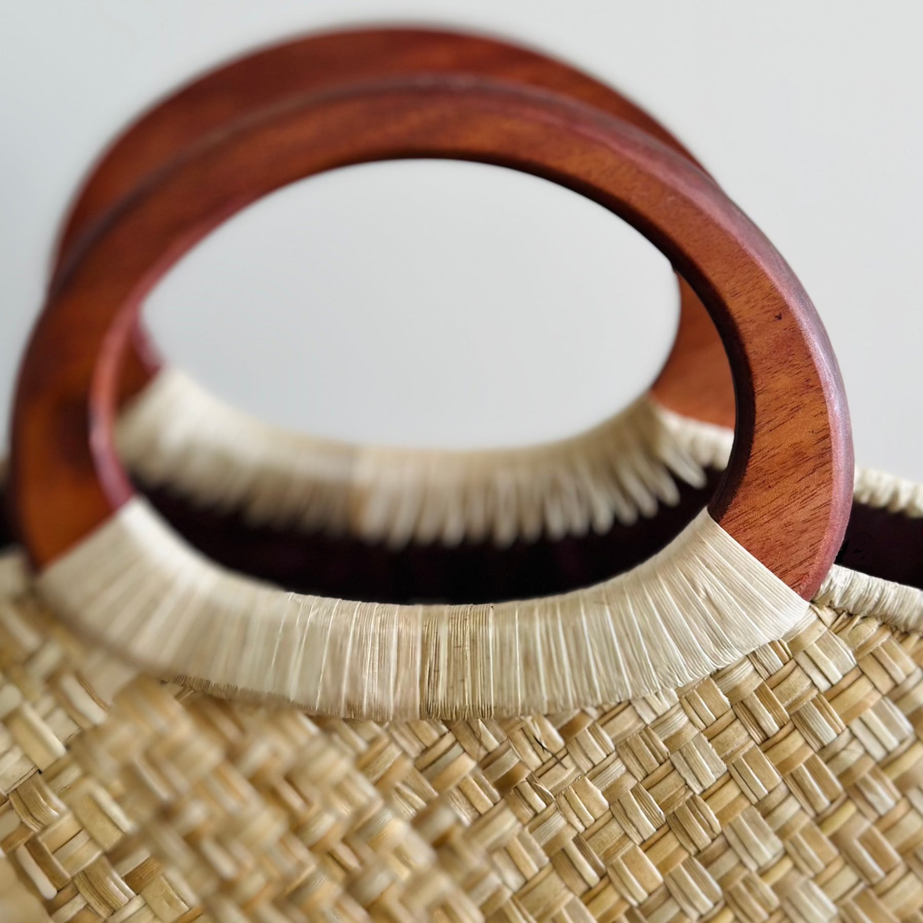 Close up of wooden handles - Kahala Natural Luxe Lauhala Purse