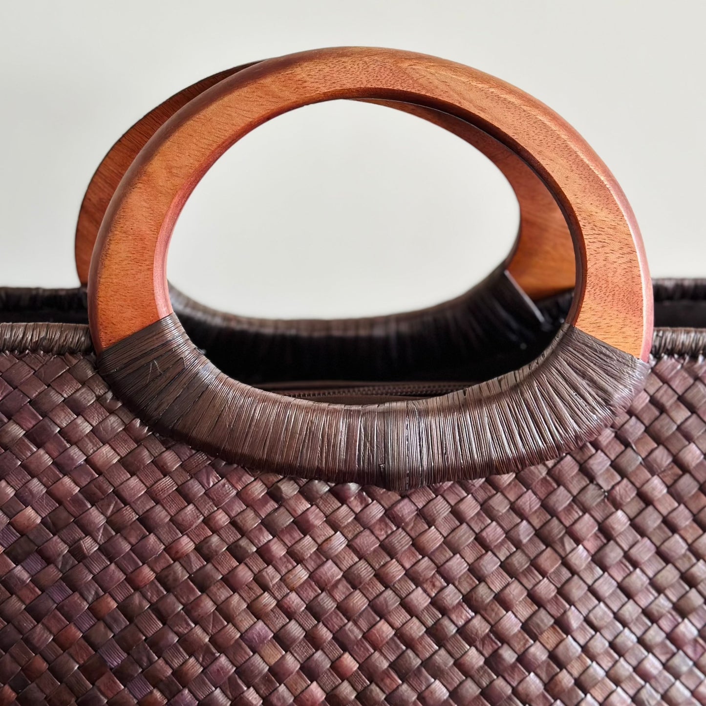 Close up of wooden handles - Manoa Cocoa Luxe Lauhala Tote Bag