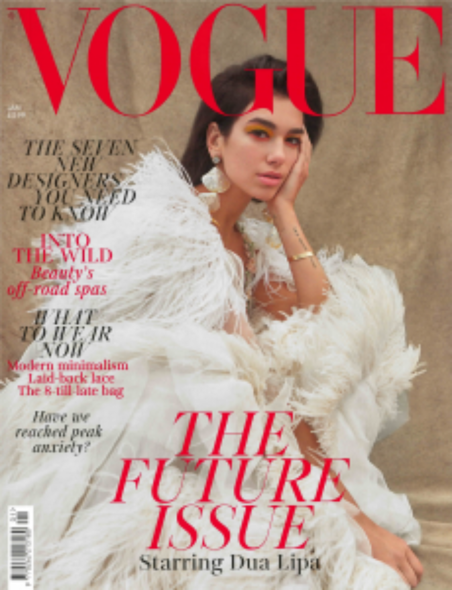 Vogue magazine cover featuring Dua Lipa in a white dress with text about the 'Future Issue'.